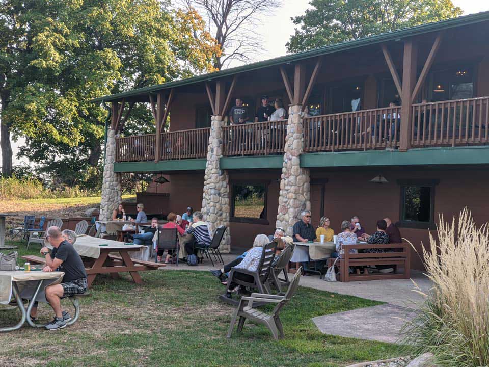 Guests relaxing on the lodge patio